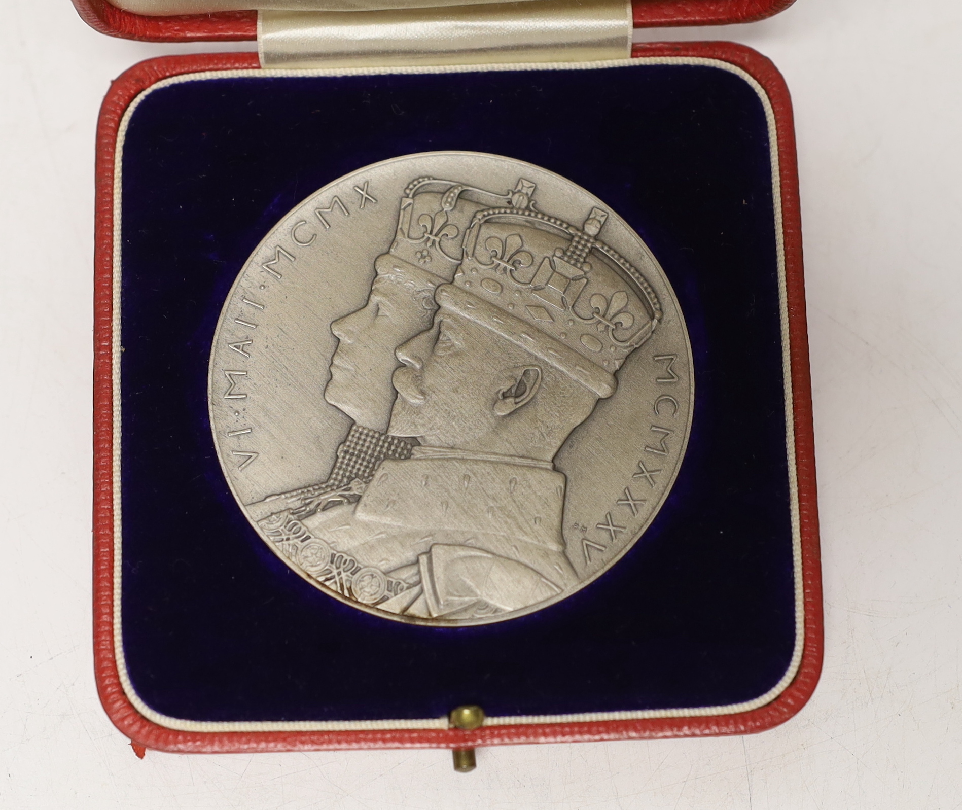A George V and Queen Mary silver jubilee commemorative silver medal with case